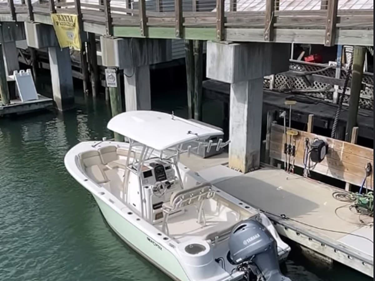 A boat pulled up at the Shem Creek dock