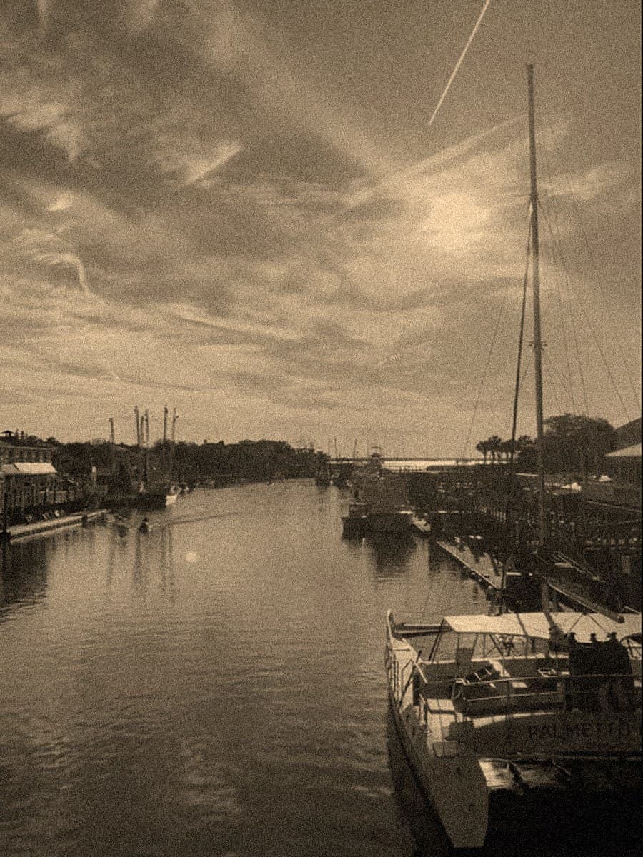 Boats along the marina channel at Shem Creek