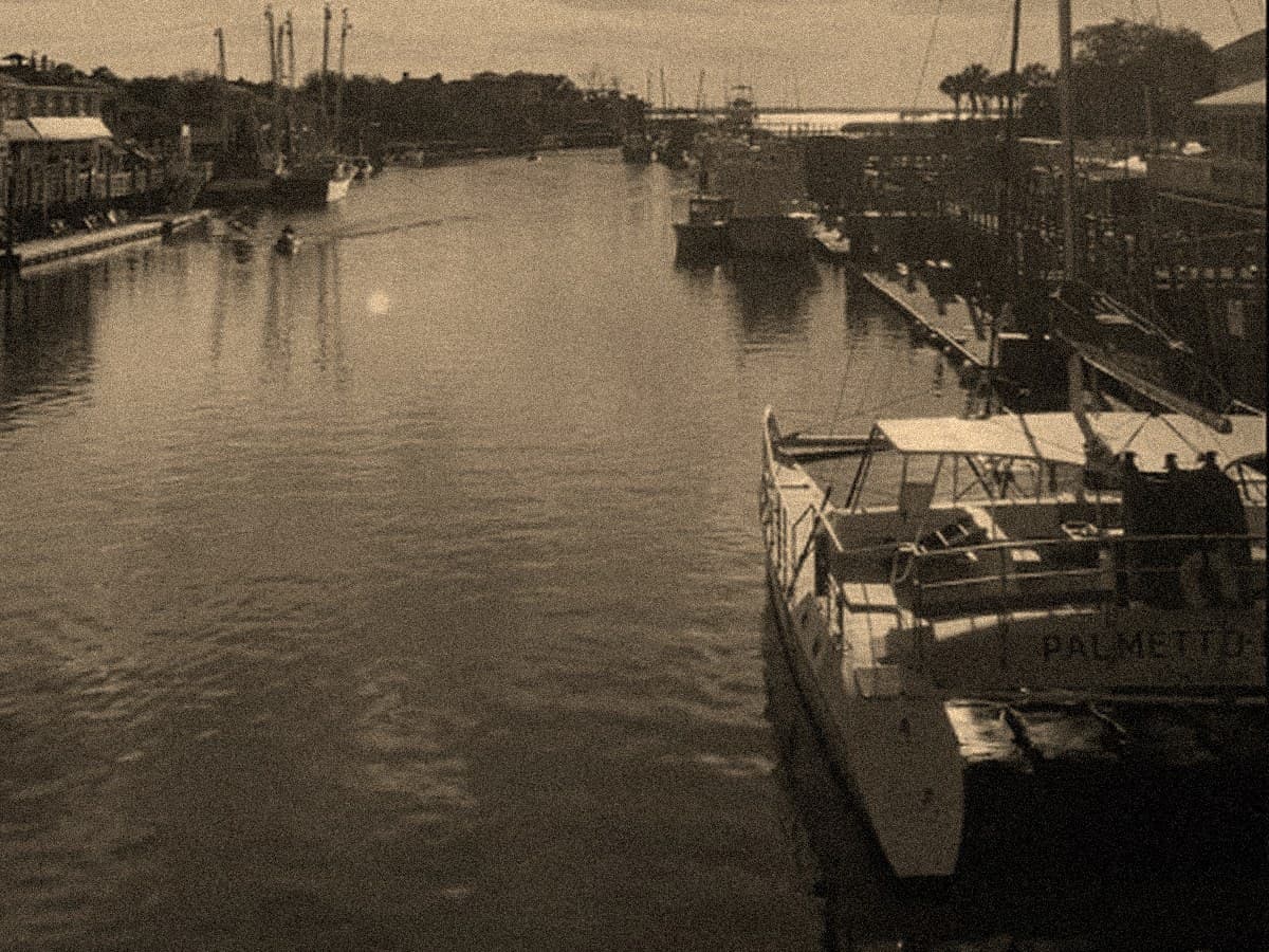 A charter tour boat on the Shem Creek channel
